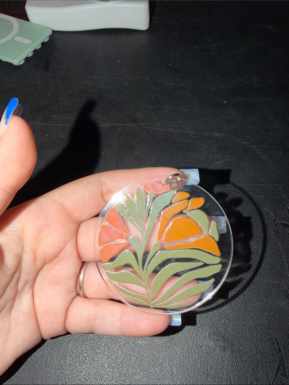 Acrylic Floral Keychain with Orange and Green Design